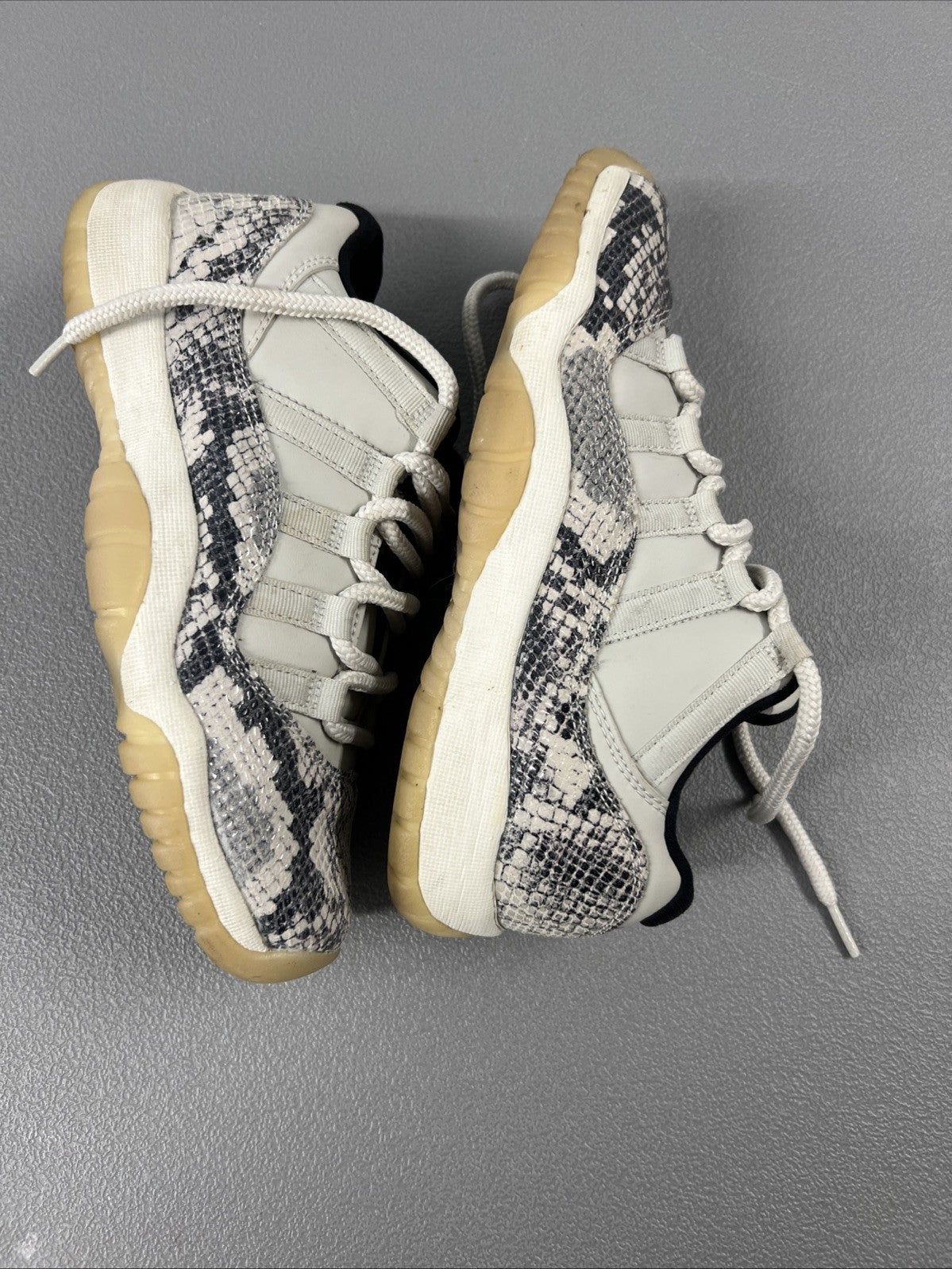 5.5 Y or 7 Wmns - Jordan 11 Retro Low Snake Light Bone (GS)
