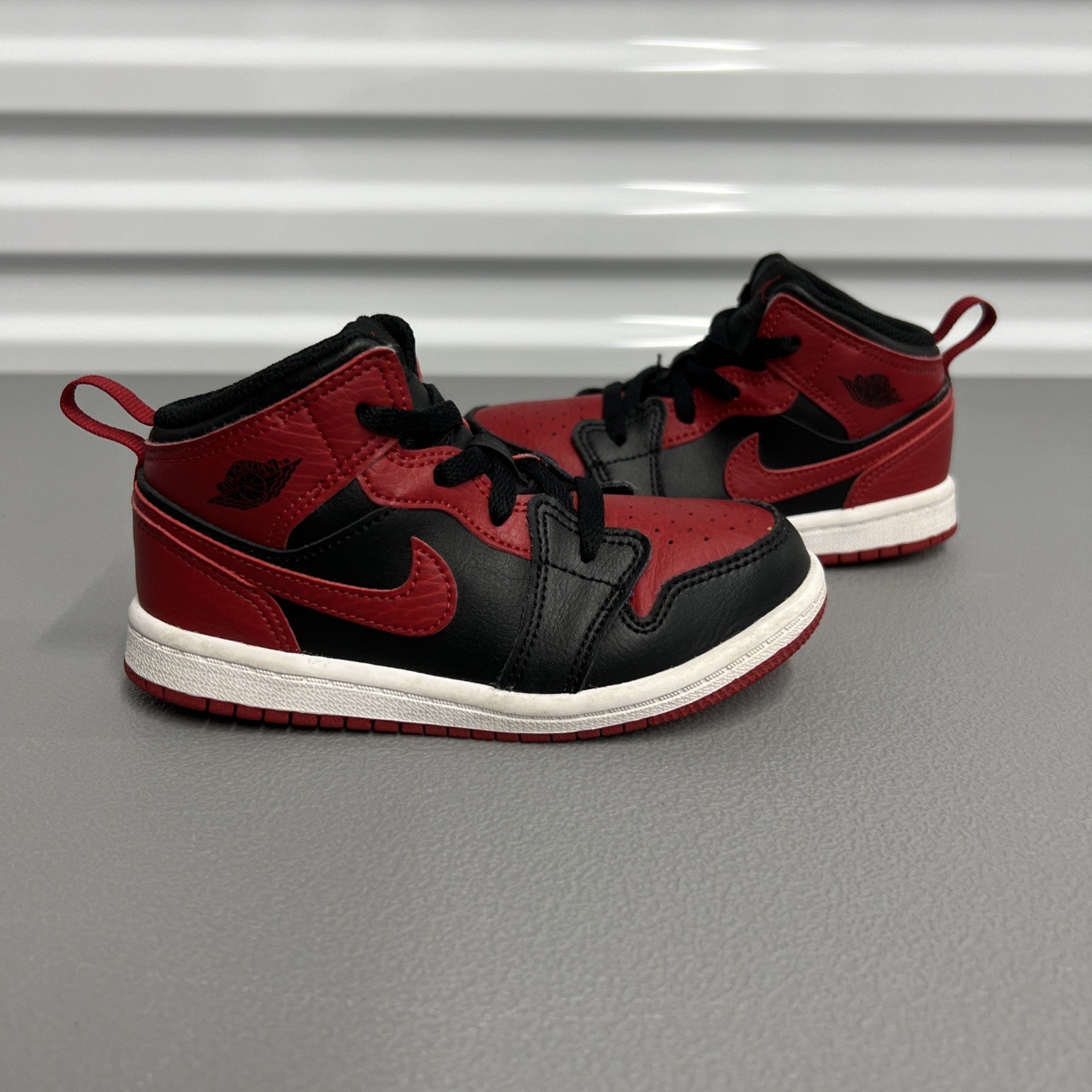 Size 9C- Air Jordan 1 Mid ‘Banned’ 2020 (Toddler)