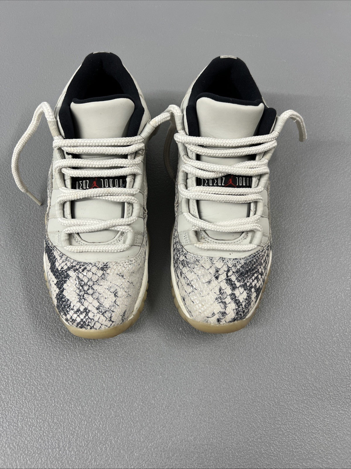 5.5 Y or 7 Wmns - Jordan 11 Retro Low Snake Light Bone (GS)