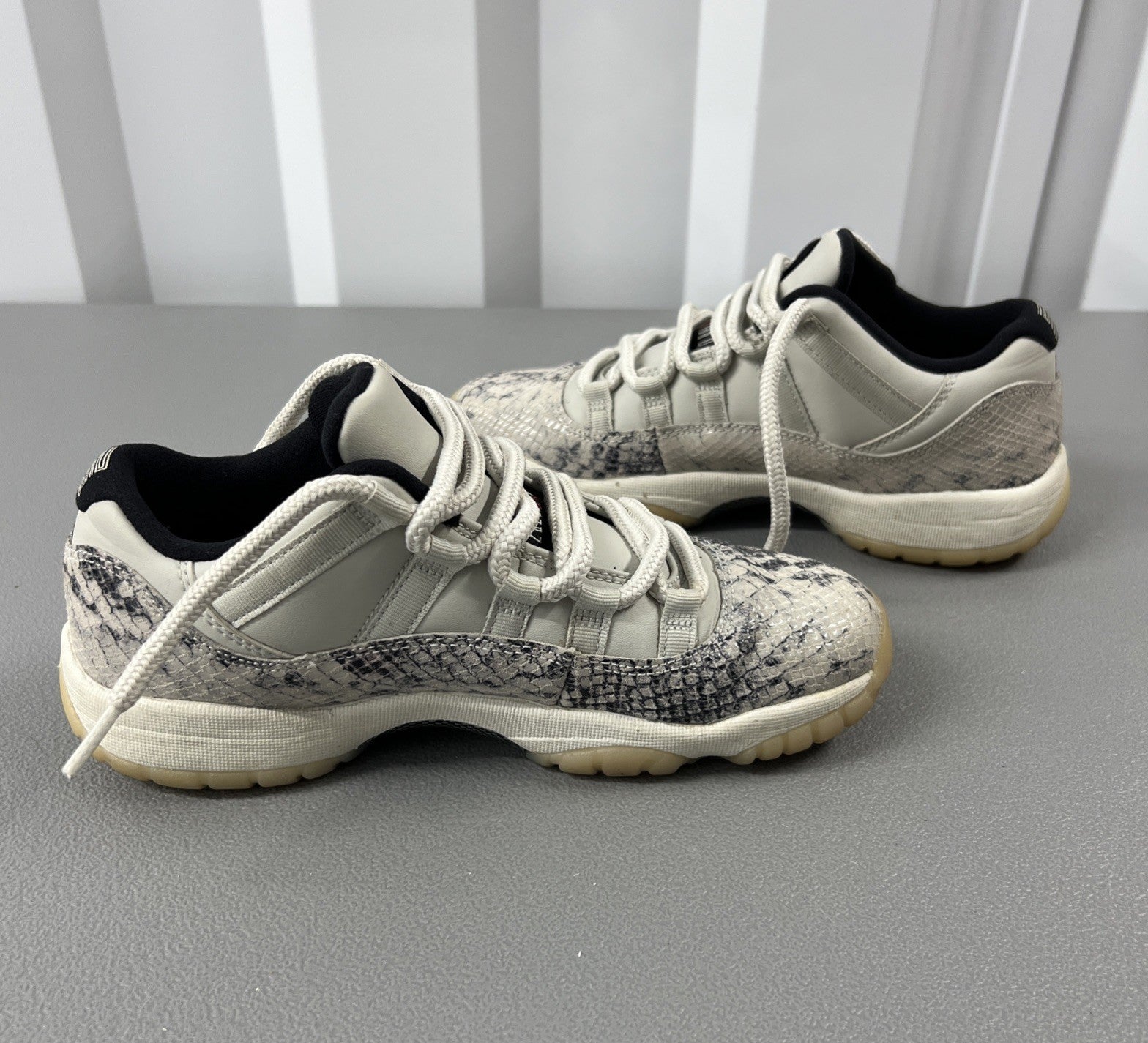 5.5 Y or 7 Wmns - Jordan 11 Retro Low Snake Light Bone (GS)