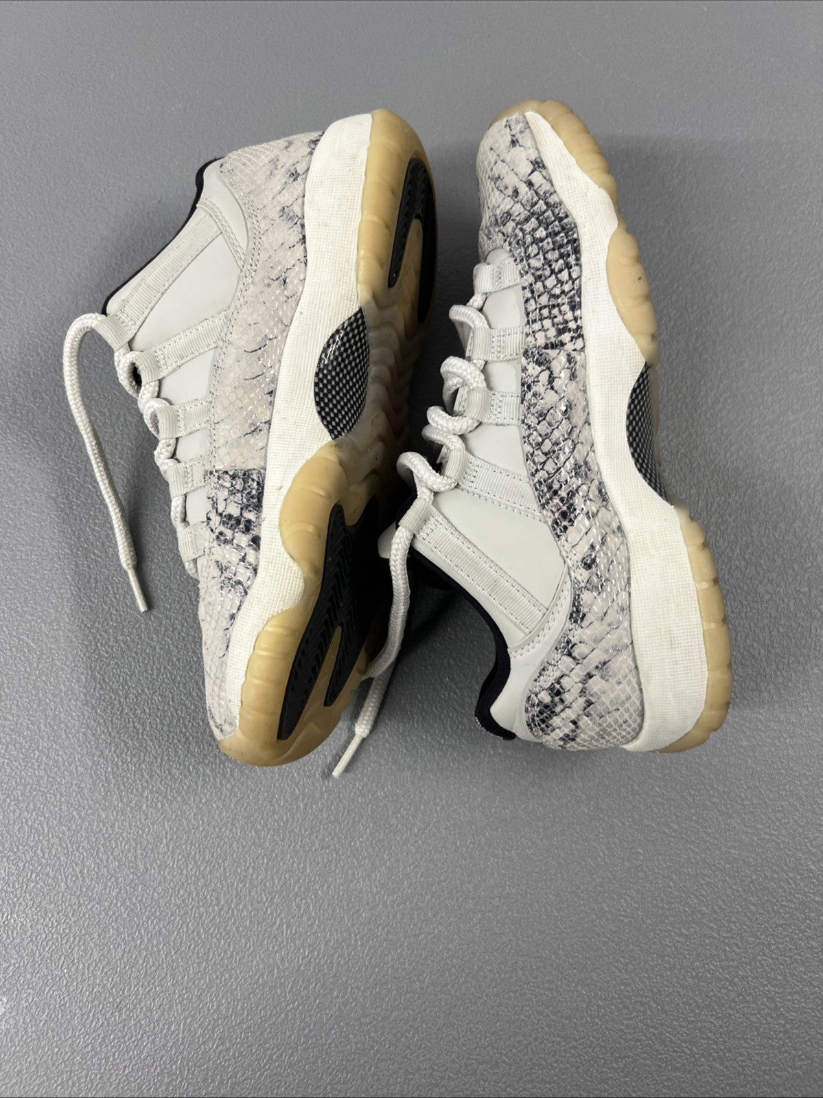 5.5 Y or 7 Wmns - Jordan 11 Retro Low Snake Light Bone (GS)