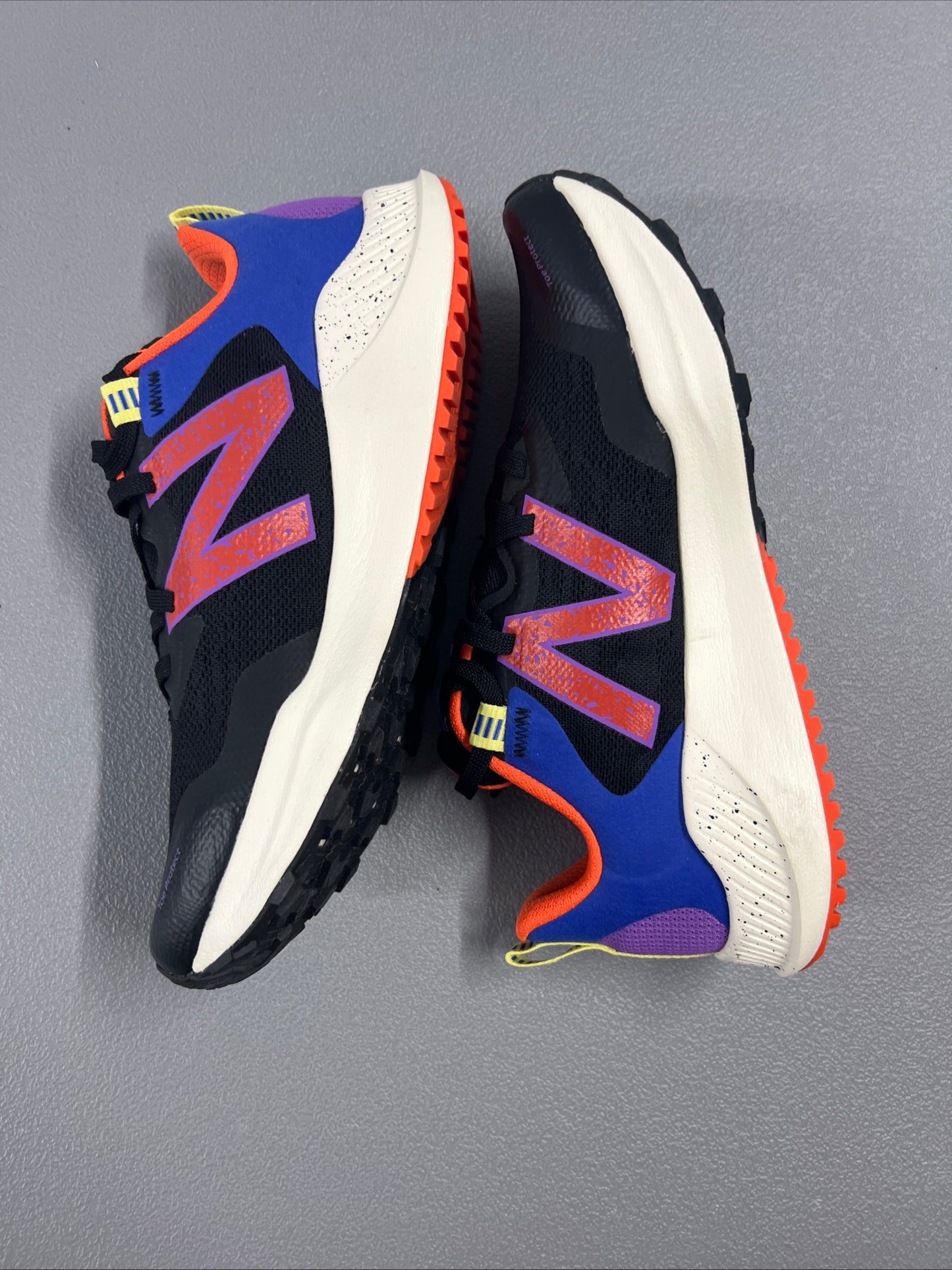 Size 9.5- New Balance DynaSoft Nitrel v4 Black Orange Purple W